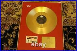 Guns N Roses BPI gold record award presented to Alan Niven