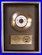 John-Lennon-Woman-45-Gold-RIAA-Record-Award-Presented-To-Geffen-Records-01-tsz