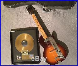 MERLE HAGGARD SIGNED 1950's KAY GUITAR & RIAA GOLD RECORD AWARD