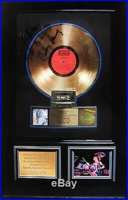 MOUNTAINSigned Corky Laing Gold Record Award Presented To MountainWOODSTOCK