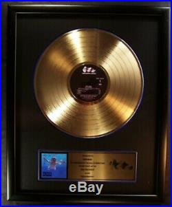 Nirvana Nevermind LP Gold Non RIAA Record Award Presented To Nirvana