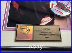 Poe hello Gold RIAA Record Award for 500,000 units of cassette & cds