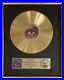 Prince-1999-Riaa-Gold-Record-Award-presented-To-Wb-Exec-Who-Signed-Prince-01-rui