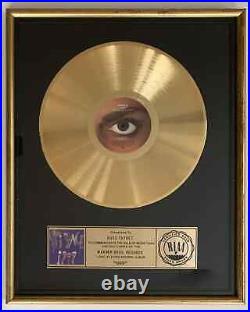 Prince'1999' Riaa Gold Record Award-presented To Wb Exec Who Signed Prince
