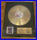 Prince-RIAA-Gold-Record-Award-Purple-Rain-Presented-to-Prince-01-lnir