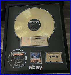 RIAA Gold Record Award Rhyme & Reason Soundtrack presented to famous Rap Artist RIAA Gold Record Award Rhyme & Reason Soundtrack presented to famous Rap Artist