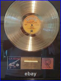 RIAA L. A. Guns Cocked & Loaded Gold Record Award Plaque, Great condition