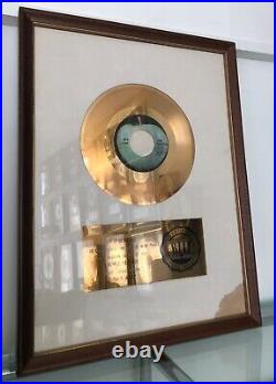 The Beatles Hey Jude RIAA gold record award presented to The Beatles, withCoA