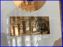 The Beatles Hey Jude RIAA gold record award presented to The Beatles, withCoA