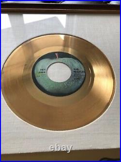 The Beatles Hey Jude RIAA gold record award presented to The Beatles, withCoA