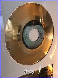 The Beatles Hey Jude RIAA gold record award presented to The Beatles, withCoA